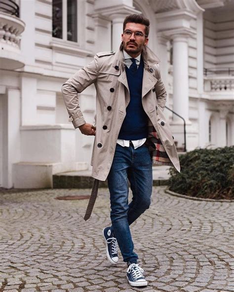 6 Best Men Trench Coats This Winter Tan Trench Coat Blue Sweater Tie Jeans White Shirt