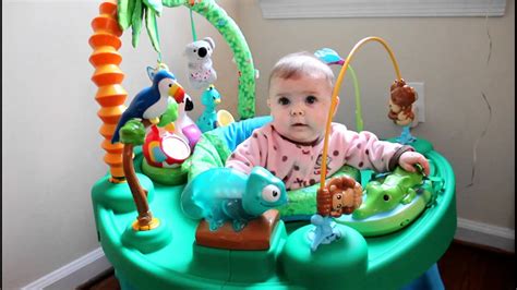 What can my baby do at five months? 5 month old jungle baby activity center - YouTube