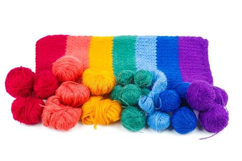 Rainbow Knitted Fabric And Balls Of Wool Thread Isolated On White Stock