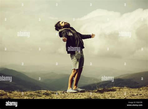 Man Hipster On Mountain Top Stock Photo Alamy