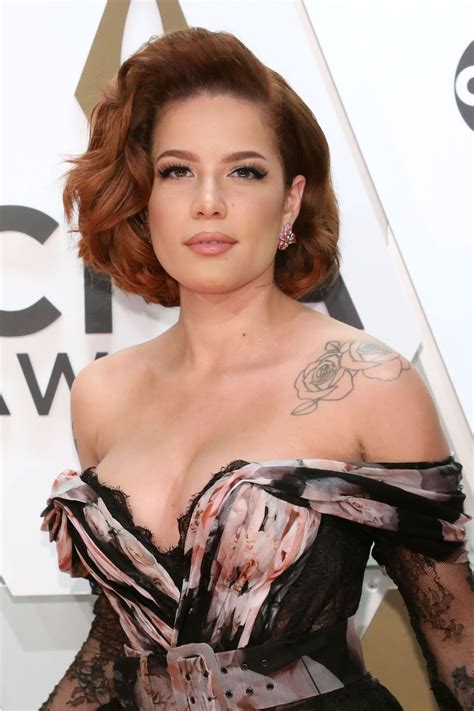 Halsey's music is categorized as indie pop ballads, usually based on her personal experiences. HALSEY at 2019 CMA Awards in Nashville 11/13/2019 - HawtCelebs