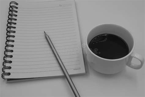 Black And White Color Tone Coffee Cup With Book For Background Stock