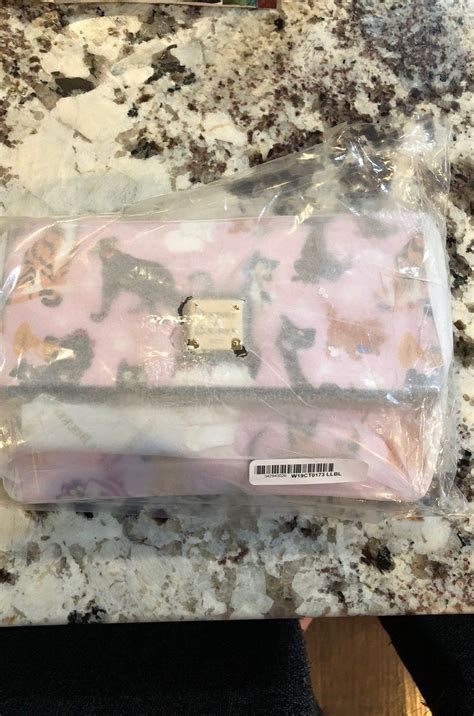 We did not find results for: NWT Disney Cats Dooney and Bourke crossbody bag (With ...