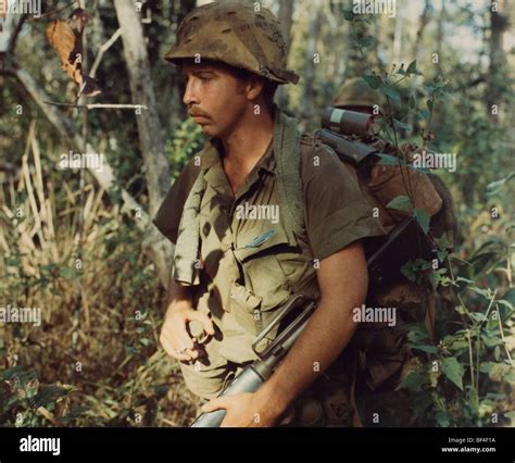 A Member Of The 1st Cavalry Division Walks On Patrol During 1968 In