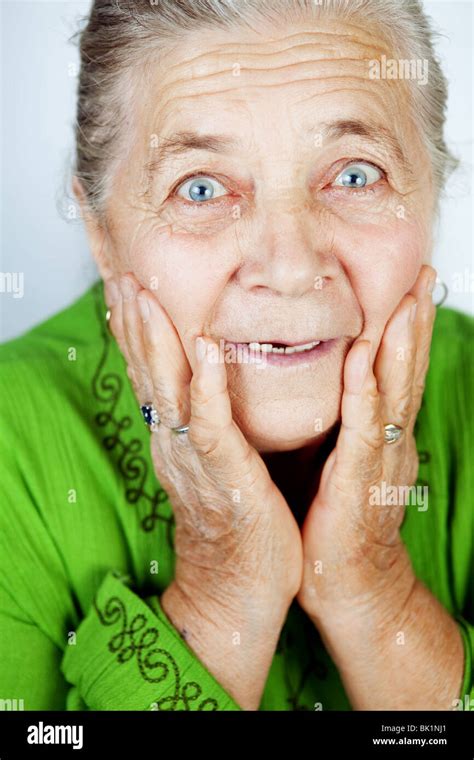 Excited Senior Woman With Surprise Expression On Her Face Stock Photo