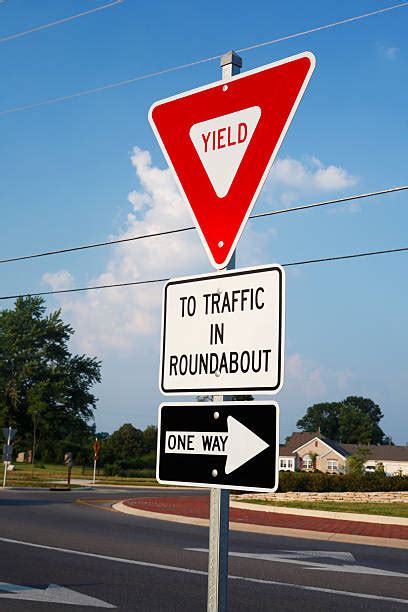 Yield Sign Intersection Stock Photos Pictures And Royalty Free Images