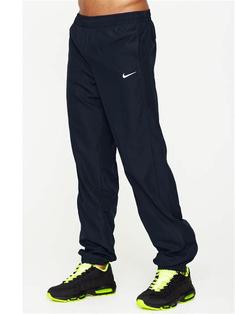 Nike Woven Cuffed Track Pants In Black For Men Lyst