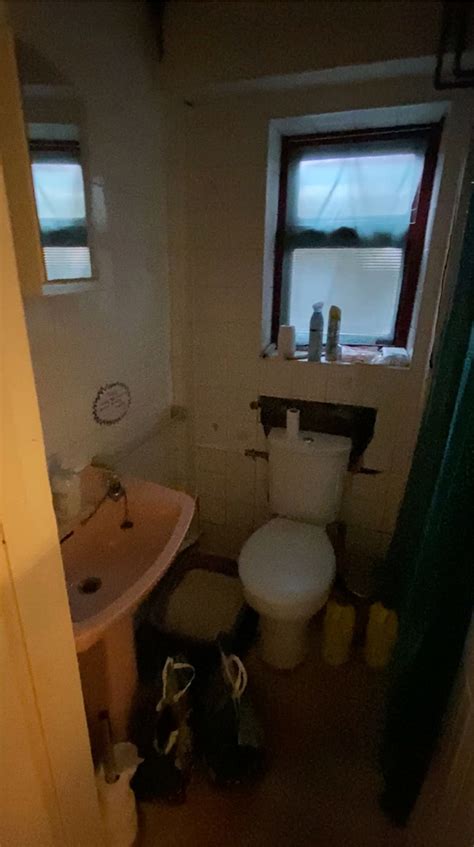 Couple discover 'freaky' hidden room behind bathroom wall