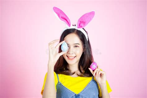 Portrait Of A Happy Young Woman Wearing Easter Bunny Ears Stock Image