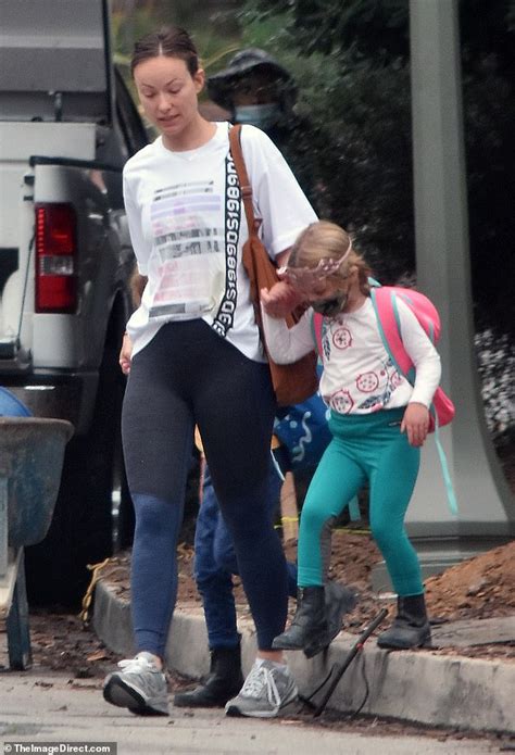 Olivia Wilde Is Causal In T Shirt And Leggings As She Runs Errands With
