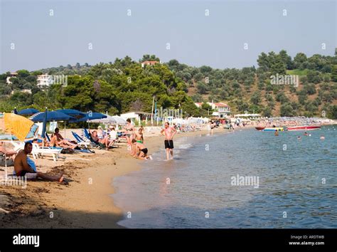 Holiday Makers At Troulos On The Greek Island Of Skiathos In The