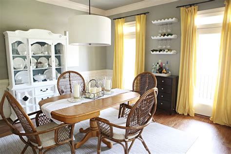 A white fireplace and ceiling beams balance dark walnut floors. Going for the Gold - Bower Power | Grey dining room ...