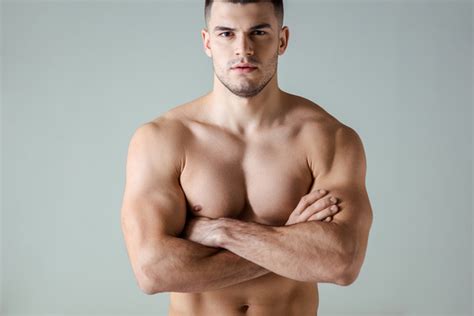 Sexy Muscular Bodybuilder With Bare Torso Posing Free Stock Photo And Image