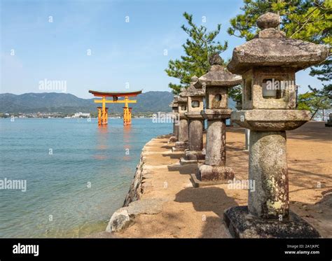 Itsukushima Floating Torii Gate In Water Isukushima Shrine Miyajima