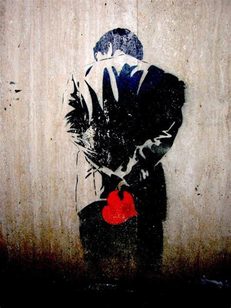 A Painting On The Side Of A Wall With A Man In A Suit Holding A Red Heart