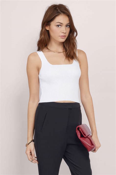 A piece of clothing for a woman's top half that does not cover her stomach 2. Buffy Ribbed Crop Top in White - $28 | Tobi US