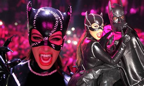 Kim Kardashian Dresses As Catwoman As She Arrives At Halloween Party With A Team Of Comic Book