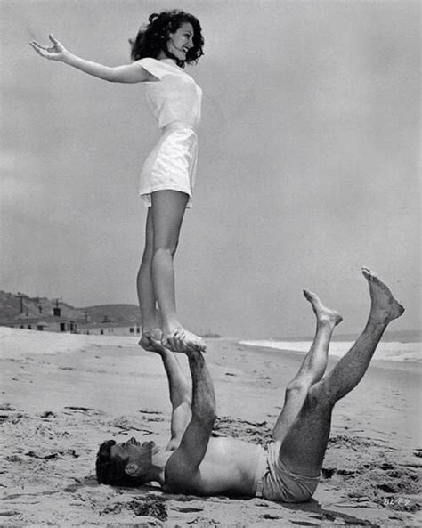 Ava Gardner And Burt Lancaster Doing Acro Yoga On The Beach Ava Gardner Classic Hollywood