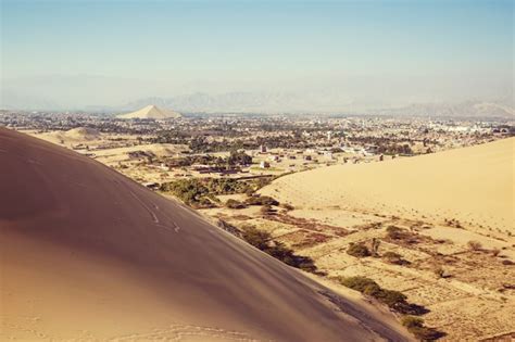 Premium Photo Oasis In Desert Sand Dunes Near The City Of Ica Peru