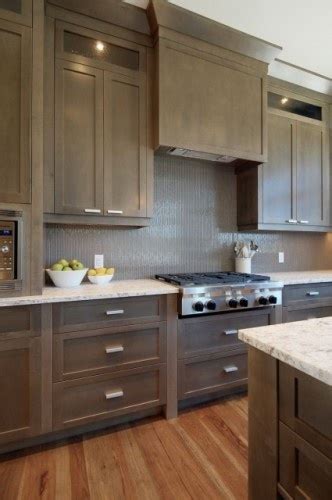 Here in this image below, the color almost looks like a dark brown with a very slight hint of gray (keep in mind that this kitchen has a lot of natural. square vent hood cover, these cabinets are awesome ...