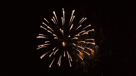 Download Wallpaper 1366x768 Fireworks Sparks Sky Night Dark Tablet