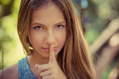Shh Woman Wide Eyed Asking For Silence Secrecy With Finger On Lips