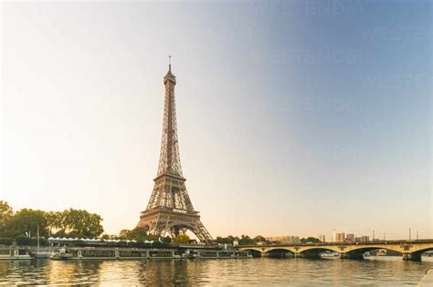 View Of Eiffel Tower In Autumn With Seine River In A Sunny Day