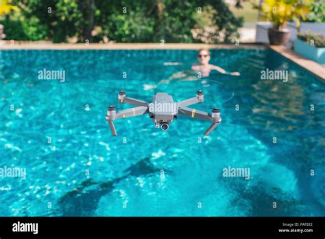 Flying Drone Over The Swimming Pool Stock Photo Alamy