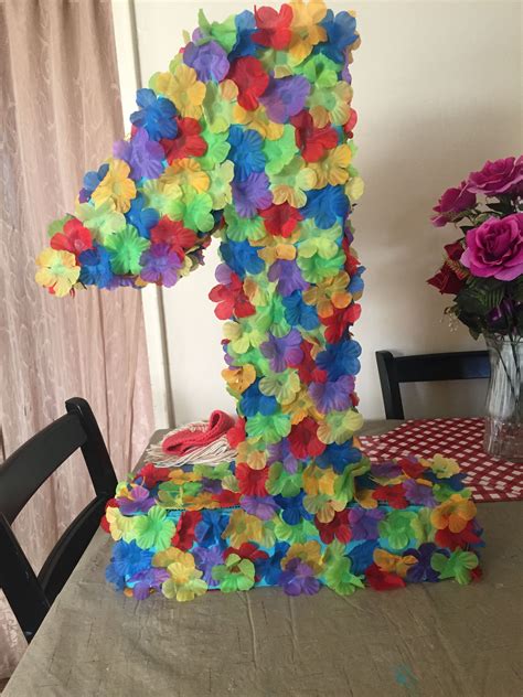 Make your own luau, pineapple party or flamingo party decorations with easy tissue paper pineapple poufs and flamingo tutorials. Diy First Birthday Hawaiian themed piñata very easy and inexpensive | Birthday decorations ...