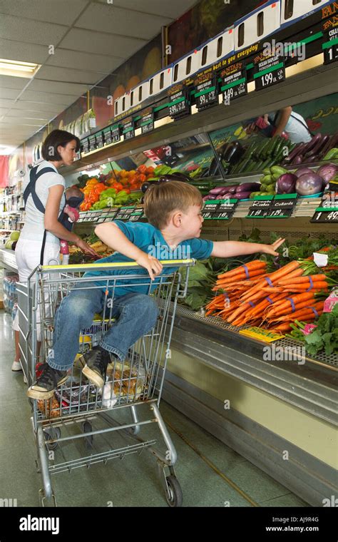 Mother And Children Grocery Shopping Stock Photo Alamy