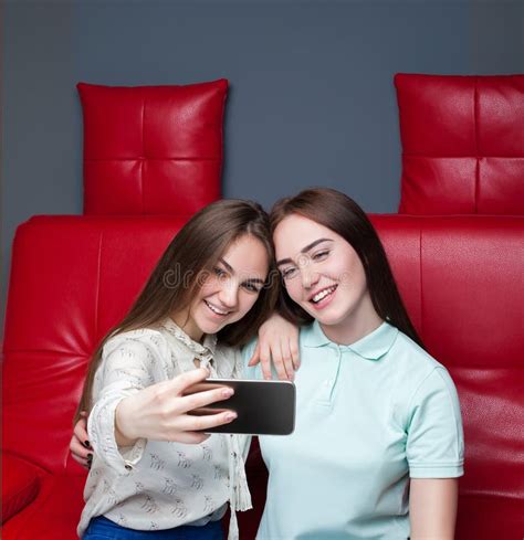 two funny girlfriends makes selfie on camera stock image image of caucasian adult 91928355