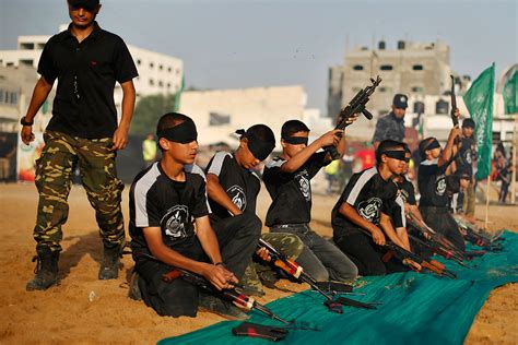 Help gaza kids to be able to deliver palestine message to all over world. Hamas Summer Camps: Palestinian Children Receive Military ...