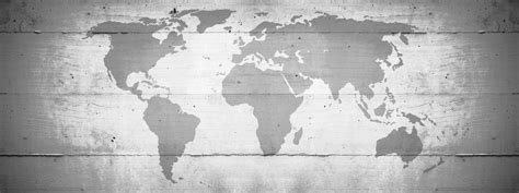 Vintage Grunge Map Of World Isolated On Rustic Gray Grey Concrete Wall