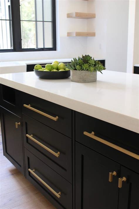 Black Shaker Style Inset Cabiets With White Quartz Gold Hardware