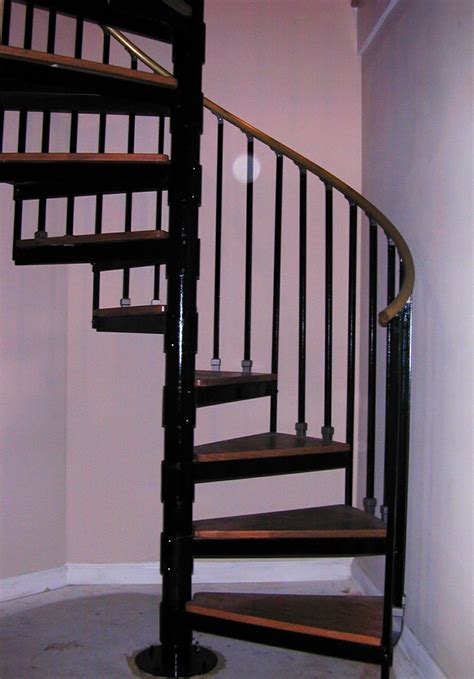 Wrought Iron Spiral Staircase With Hardwood Floating Steps Spiral