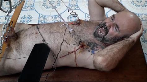 The Slave Is Tortured With A Barbed Wire And With Electricity