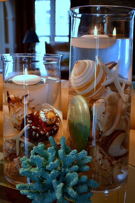 Center Piece With Beautiful Shells Coral And Floating Candles For A