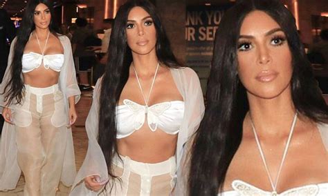 Kim Kardashian Flaunts Her Abs In Butterfly Bra Top With Sheer Slacks
