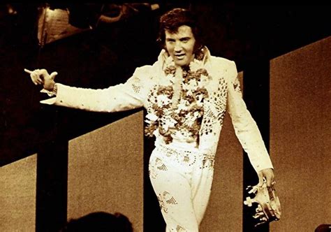 Elvis With A Crown Given To Him By A Fantoo Humble To Put It On