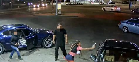 Woman Caught On Live Camera Feed Shooting At A Driver At A Detroit Gas