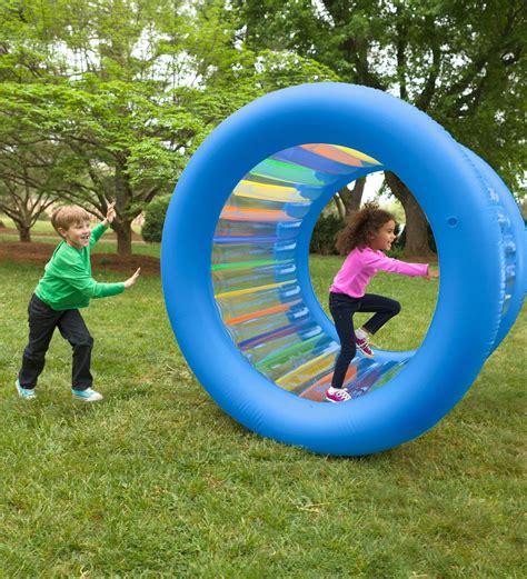 Strike a balance between fun and a. Roll With It! Giant Inflatable Colorful Rolling Wheel | 12 ...