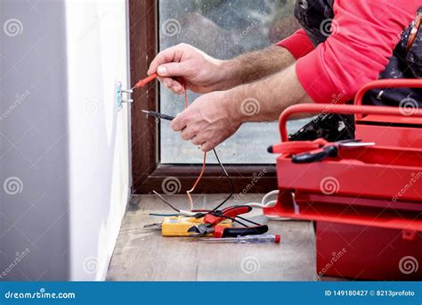 Electrician At Work Home Renovation Electrical Installation Hand Of