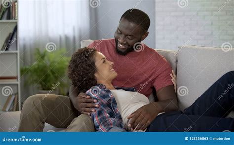 Man With Affection And Tenderness Looking At Pregnant Wife Love And Tenderness Stock Image