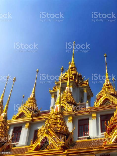 Detail Of Golden Roof At The Temple Of Dawn In Bangkok At Sunset Stock
