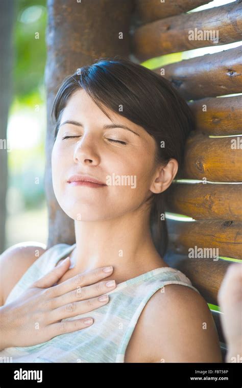 Woman Relaxing With Eyes Closed Stock Photo Alamy