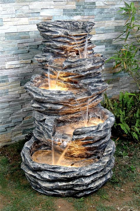 Creative garden fountains in glass container. Outdoor Living UK: Water Features on Display at the Kent ...