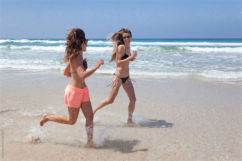 Best Friends Having Fun On The Beach Summer Holiday By Stocksy Contributor Mattia Stocksy