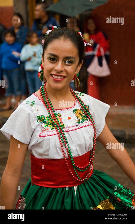 A Mexican Woman In Traditional Peasant Costume Walks In