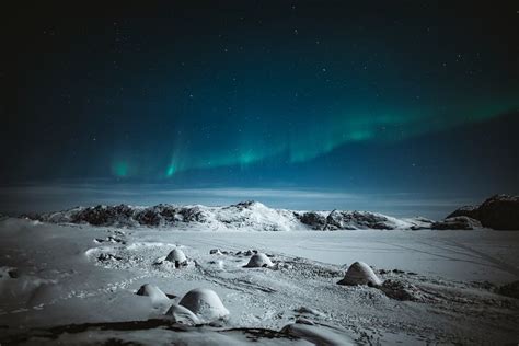 Download Premium Image Of Northern Lights Over Snowy Greenland By Luke