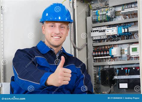Portrait Of A Happy Young Male Electrician Stock Photo Image Of